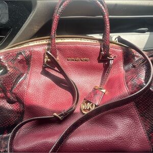 Michael Kors dark red pebble skin tote w/ gold tone hardware & snake skin accent